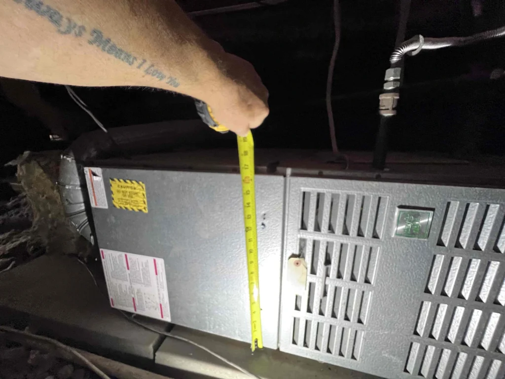 Tape Measure Showing Existing Furnace Height